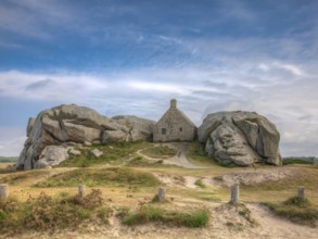 The Guard House (Corps de Garde) ("Customs House") between two huge granite rocks, Site de Meneham,