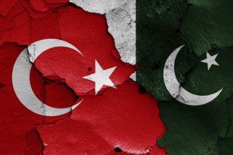 Flags of Turkey and Pakistan painted on cracked wall