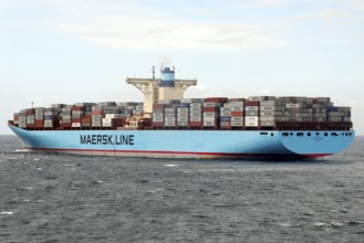 Large Maersk Line container ship loaded on the high seas under a bright blue sky, Morocco, Africa