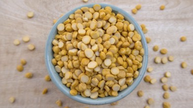 Flat Lay of Split Chickpeas Lentils in a Blue Bowl, Top View