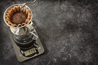 Alternative Coffee Brewing. Dripping Water From Gooseneck Kettle Into Coffee Dripper Filter Holder