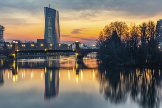 View across the Main to the ECB. Sunrise in the background of the buildings. Taken in the morning