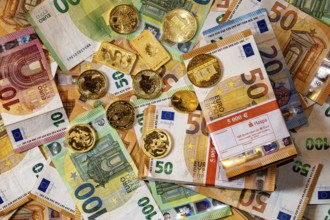 Gold and banknotes, euros and gold coins and gold bars, piles and bundles