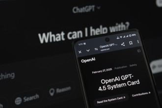 A smartphone screen featuring the introduction of GPT-4.5, with the ChatGPT website visible on a