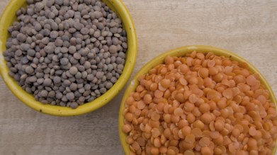 Split Red Lentils and Whole Brown Lentils in Yellow Bowl, Vegan Food, Top View, Healthy Legume
