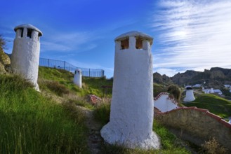 Guadix cave houses chimneys in Granada Spain at Andalusia