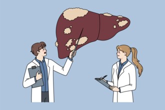 Diverse doctors in medical uniforms examine sick patient liver. Therapist make ultrasound body
