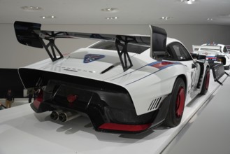 Porsche 935, White sporty racing car with spoiler in an exhibition, New Porsche Museum 2009,