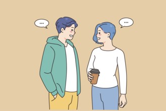 Stylish teenage couple enjoy date out communicating and laughing. Trendy subculture man and woman