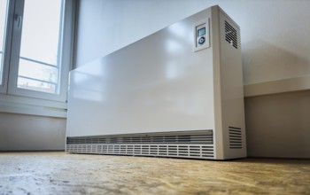 Night storage heating in a room in Düsseldorf, Germany, Europe