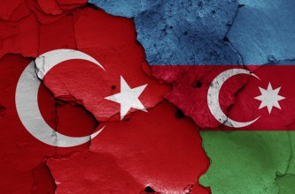 Flags of Turkey and Azerbaijan painted on cracked wall