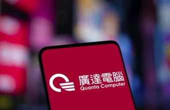 Quanta computer logo is displayed on smartphone. Quanta Computer Incorporated is a Taiwan