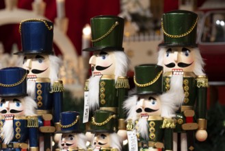 Various nutcrackers in a festive arrangement, popular Christmas decoration at a Christmas market,