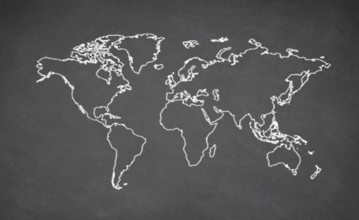 World map drawn on chalkboard. Chalk and blackboard