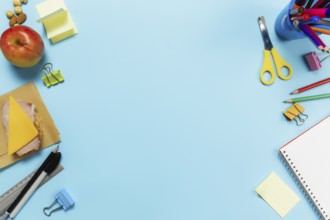 Flat lay with school, work or creativity concept with various schooling accessories, pens, pencil,