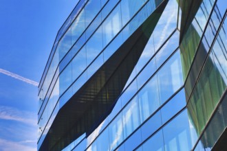 Detail of a glass façade with reflections of the sky in modern style, Prime Tower, Zurich, glass