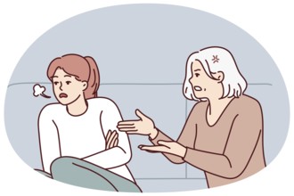 Mature mother scold unhappy grownup daughter at home. Elderly mom lecture stressed annoyed adult