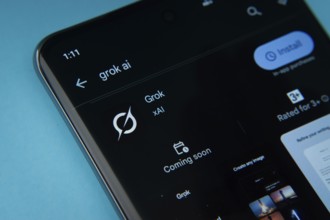 The Grok app from Google Playstore is displayed on a smartphone screen