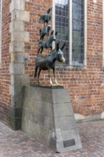 The famous bronze statue of the Bremen Town Musicians with the figures of a donkey, dog, cat and