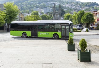 Bus passing Santos Passos Church, Largo da República do Brasil, Campo da Feira, city of Guimaraes,