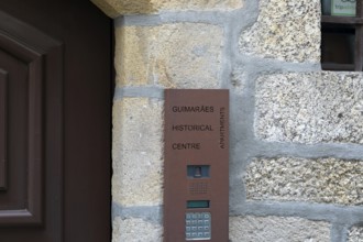 Sign for apartments in historical centre 15 Rua de Donas, city of Guimaraes, northern Portugal
