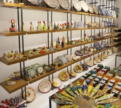 Ceramic pottery gifts display inside tourist souvenir craft shop, Guimaraes, northern Portugal