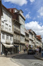 Shops in historic buildings, Rua de Santa Antonio, city centre Guimaraes, northern Portugal
