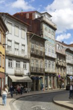 Shops in historic buildings, Rua de Santa Antonio, city centre Guimaraes, northern Portugal