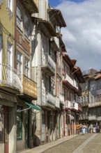 Historic medieval buildings in city centre, Rua Rainha Dona Maria I, Guimaraes, northern Portugal