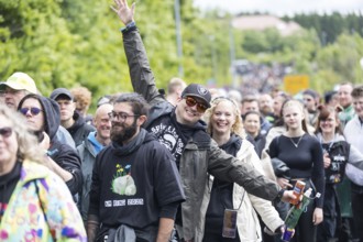Festival visitors in front of the main entrance at the Rock am Ring Festival on Friday, Nürburgring