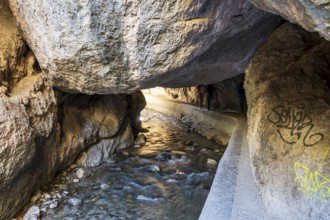 Hiking path Los Cahorros de Monachil, along the Rio Monachil river, narrow path in the river gorge,