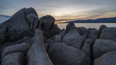 Sunset, rocky coast near Porto Pollo, Corsica, France, Europe