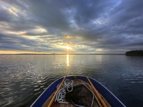 Evening mood, view from a rowing boat, Lake Starnberg, Bavaria, Germany, Europe