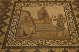 Ancient mosaic depicting a scene with three people, artistically embedded in the floor, Roman House