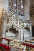 Stained glass windows and memorial tombs in chancel of Church of Saint Mark, Bristol, England, UK