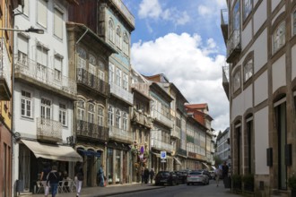 Shops in historic buildings, Rua de Santa Antonio, city centre Guimaraes, northern Portugal
