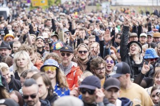Festival visitors in front of the main entrance at the Rock am Ring Festival on Friday, Nürburgring