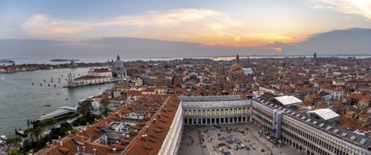 Panorama, St Mark's Square and Basilica di Santa Maria della Salute on the Grand Canal at sunset,