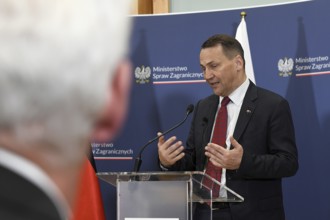 Polish Foreign Minister Radoslaw Sikorski at a joint press conference with his German counterpart,