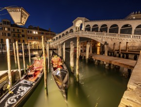Rialto Bridge and gondolas on the Grand Canal, blue hour, long exposure, Venice, Veneto, Italy,