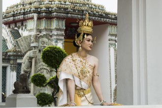 Thai traditionally and festively dressed young woman, Wat Pho, Bangkok, Thailand, Asia