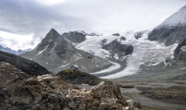 Mountain hut Cabane des Dix in front of glacier Glacier de Cheilon and summit Mont Blanc de