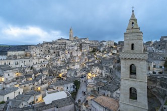Panoramic View of Sassi di Matera at dusk, Sasso Barisano, Basilicata, Italy, Europe