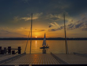 Sailing boat at sunset, Lake Starnberg, Bavaria, Germany, Europe