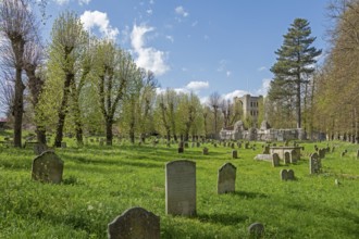 Norman tower, also called church gate, graveyard, gravestones, Bury St Edmunds, West Suffolk,