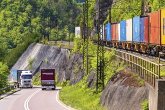 Goods train travelling on the winding Geislinger Steige railway line. Landscape along the railway