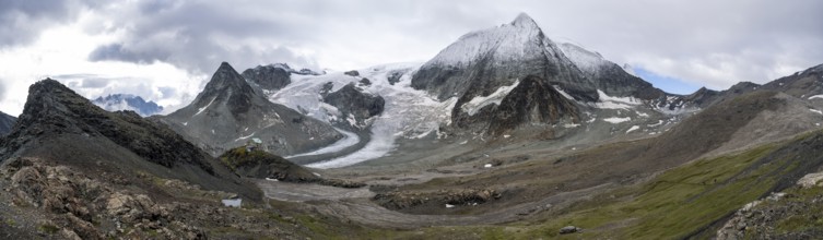 Mountain hut Cabane des Dix in front of glacier Glacier de Cheilon and summit Mont Blanc de