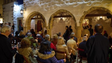 Good Friday, Church of Agios Ioannis Prodromos, worshippers, gathering of people with candles in