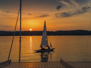 Sailing boat at sunset, Lake Starnberg, Bavaria, Germany, Europe