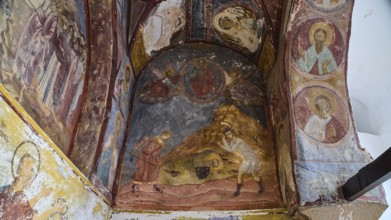 Medieval fresco with religious figures and a mountain scene, Burial of St John the Apostle,